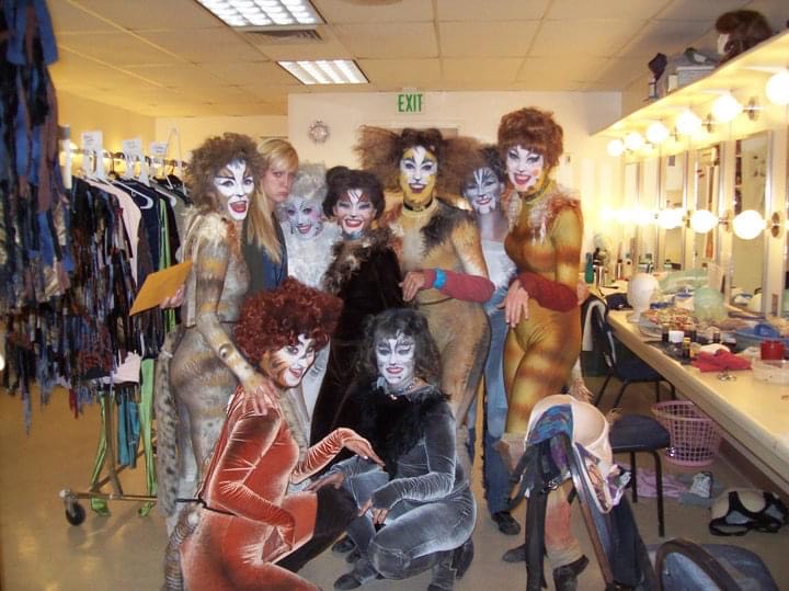 dressing room picture of Diana with her friends all dressed up in their costumes for Cats